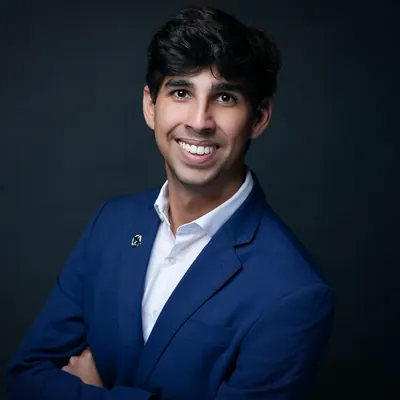 Daniel Ruiz Jimenez in a navy blazer